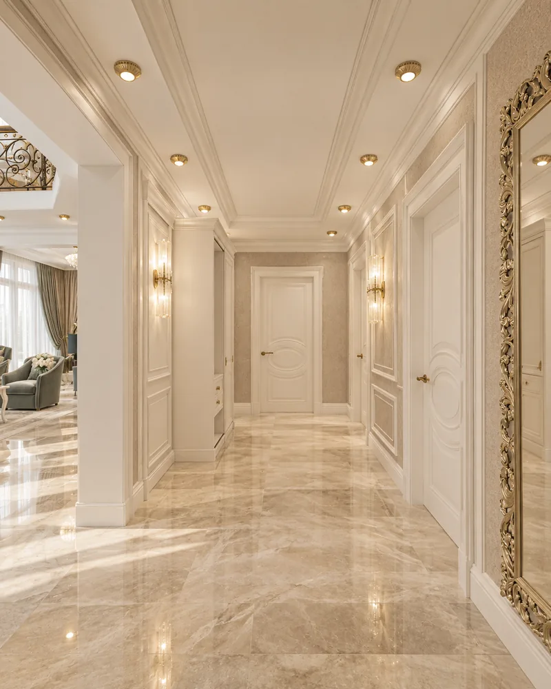 Ground-floor corridor with polished marble floor, white panelled doors, crystal sconces and an ornate gilt floor mirror