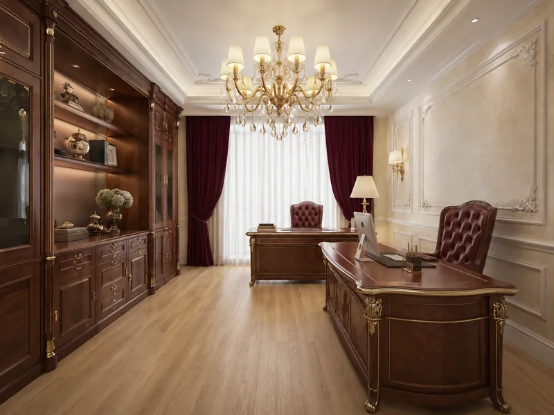 Classic home office with carved walnut desk, burgundy leather chairs and walnut glass-door bookcases
