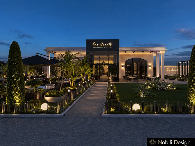 Event venue exterior design at dusk with glass entrance volume, lit path, cypress trees and landscaped beds