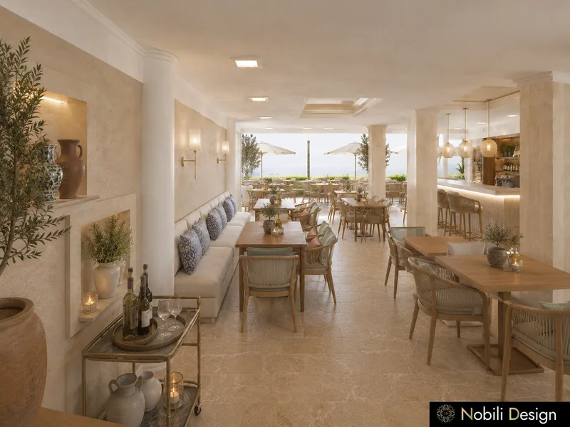 Restaurant dining room with long banquette, oak tables, wall niches with clay jars and a serving cart