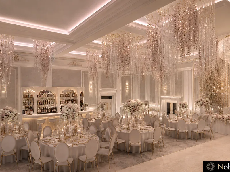 Wedding ballroom with a lit bar with arched shelves, round tables in white linen and crystal ceiling installations