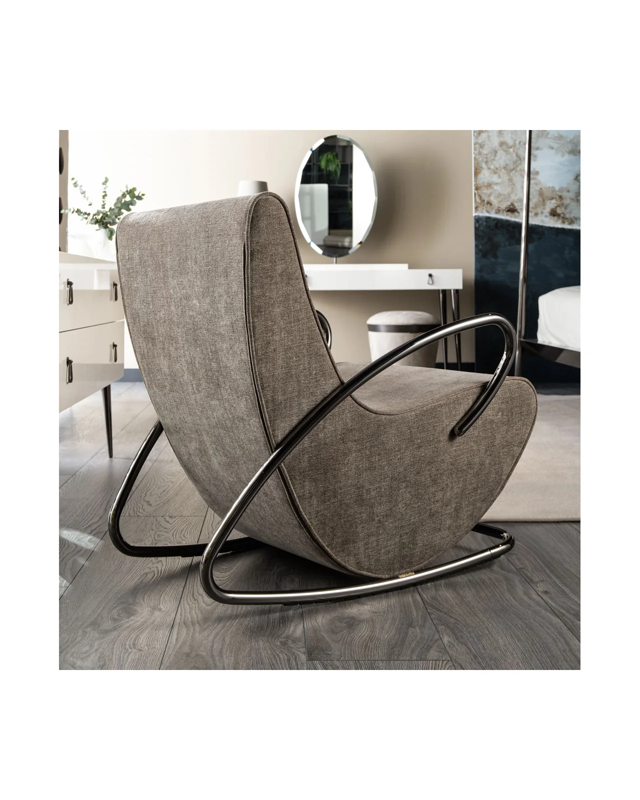 Camilla rocking armchair by Cantori, in an interior setting, photo 2 of 9