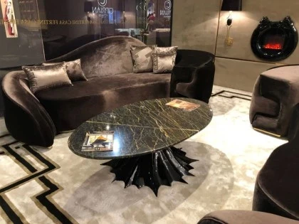 Luxury Gattopardo coffee table with a striking spider pedestal base and premium marble top.