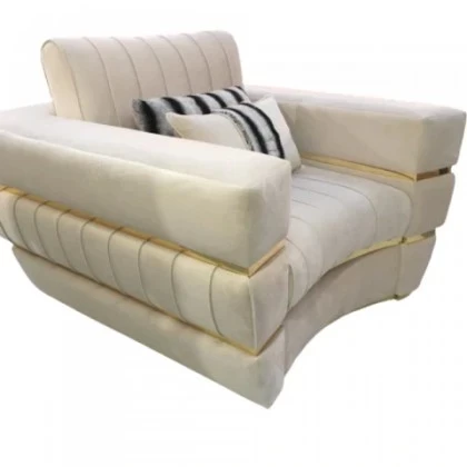High-end Signature collection armchair in soft velvet, offering glamorous comfort for luxury residential spaces.