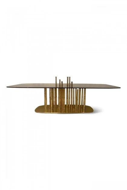 Exclusive Lotus coffee table with gold-plated bamboo details and a clear glass top for elegance.