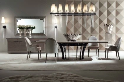 Sculptural Alchemy armchair combining Italian craftsmanship with refined materials for a luxurious seating experience.