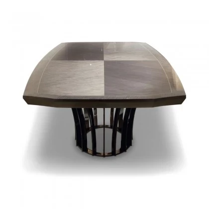 Unique boat-shaped oval dining table offering a sophisticated silhouette for formal modern dining spaces.