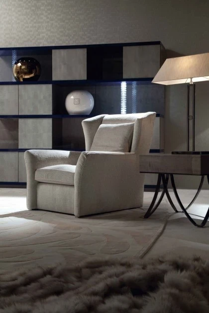 Contemporary Osaka chair showcasing the signature sculptural lines and refined materials of the Alchemy series.