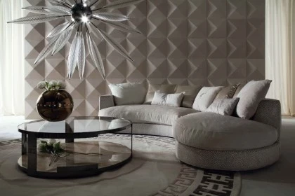 Elegant oval cocktail table with a premium finish reflecting the sculptural aesthetic of Alchemy furniture.