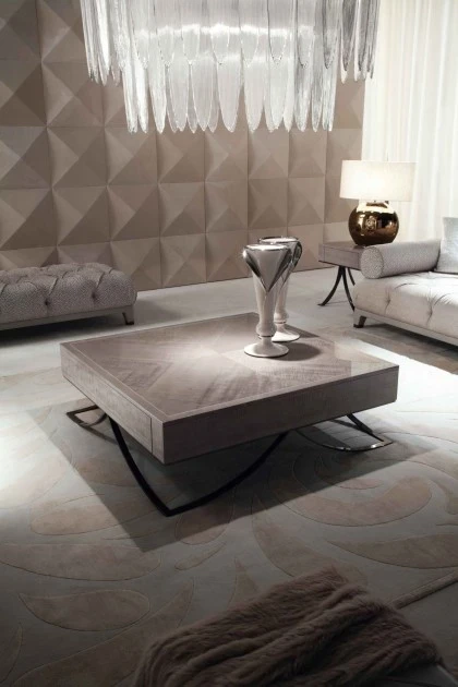Modern square coffee table with architectural metal details and a high-quality contemporary wood surface.
