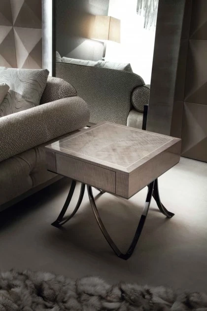 Compact square end table featuring refined finishes to complement the Alchemy sofa and seating arrangements.