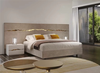 Luxury Reflex Angelo bedroom featuring an upholstered bed with refined finishes and a premium atmosphere.